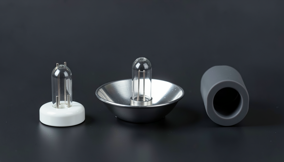 Bare quartz arc burner, burner seated in a parabolic reflector, and a complete sealed lamp cartridge shown side by side